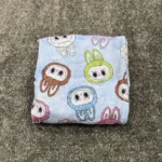 حوله تن پوش پالتویی کودک برق لامع لبوبو آبی - تصویر 3